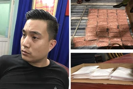 Đối tượng Didonna Quốc Anh Phillip và tang vật vụ án. (Nguồn: TTXVN phát)