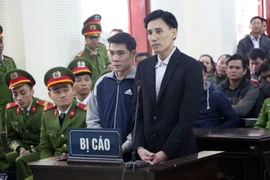 Bị cáo Hoàng Đức Bình tại phiên xét xử. (Ảnh: Bích Huệ/TTXVN)