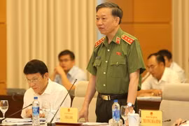 Bộ Trưởng Bộ Công an Tô Lâm trả lời chất vấn của các đại biểu Quốc hội. (Ảnh: Dương Giang/TTXVN)