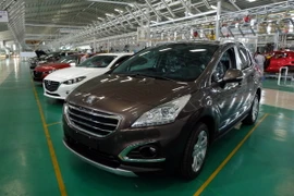 Xe ôtô thành phẩm tại Khu phức hợp sản xuất và lắp ráp ôtô Chu Lai- Trường Hải (Quảng Nam). (Ảnh: Đỗ Trưởng/TTXVN)