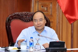 Thủ tướng Nguyễn Xuân Phúc phát biểu tại cuộc họp. (Ảnh: Thống Nhất/TTXVN)