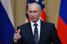 Tổng thống Nga Vladimir Putin trong cuộc họp báo chung sau hội nghị thượng đỉnh với Tổng thống Mỹ Donald Trump ở Helsinki, Phần Lan ngày 16/7. (Nguồn: AFP/ TTXVN)