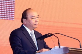 Thủ tướng Nguyễn Xuân Phúc phát biểu tại diễn đàn. (Ảnh: Thống Nhất/TTXVN)