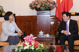 Phó Thủ tướng, Bộ trưởng Bộ Ngoại giao Phạm Bình Minh tiếp bà Mounia Boucetta, Quốc vụ khanh Bộ Ngoại giao và hợp tác quốc tế Maroc đang làm việc tại Việt Nam. (Ảnh: Dương Giang/TTXVN)
