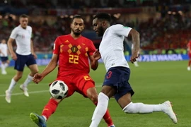 Tình huống tranh bóng giữa cầu thủ hai đội. (Nguồn: Reuters)