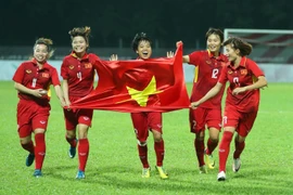 Đội tuyển bóng đá nữ Việt Nam giành huy chương vàng SEA Games 29, lần thứ 5 bước lên bục cao nhất tại đấu trường SEA Games. (Ảnh: Quốc Khánh/TTXVN)