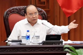 Thủ tướng Nguyễn Xuân Phúc chủ trì Phiên họp Thường trực Chính phủ về Dự án đường sắt đô thị Thành phố Hồ Chí Minh. (Ảnh: Thống Nhất/TTXVN)
