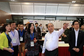 Thủ tướng Nguyễn Xuân Phúc kiểm tra công tác chuẩn bị hội nghị. (Ảnh: Thống Nhất/TTXVN)
