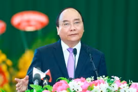 Thủ tướng Nguyễn Xuân Phúc dự Hội nghị xúc tiến đầu tư-thương mại-du lịch vào tỉnh Trà Vinh năm 2017. (Ảnh: Thống Nhất/TTXVN)