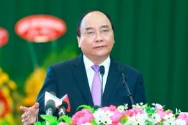 Thủ tướng Nguyễn Xuân Phúc dự Hội nghị xúc tiến đầu tư-thương mại-du lịch vào tỉnh Trà Vinh năm 2017. (Ảnh: Thống Nhất/TTXVN)