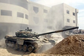 Binh sỹ Syria trong chiến dịch truy quét phiến quân tại Jobar, phía đông thủ đô Damascus, Syria. (Nguồn: THX/TTXVN)
