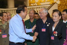 Phó Thủ tướng Thường trực Chính phủ Trương Hòa Bình với các đại biểu. (Ảnh: Doãn Tấn/TTXVN)