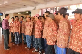 Ngư dân Việt Nam được Indonesia trao trả. (Ảnh: Đỗ Quyên/Vietnam+)