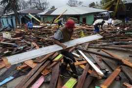 Nhà cửa bị hư hại do bão Eta tại Bilwi, Nicaragua. (Ảnh: AFP/TTXVN)