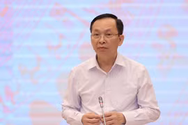 Phó Thống đốc Ngân hàng Nhà nước Đào Minh Tú phát biểu tại họp báo Chính phủ. (Ảnh: PV/Vietnam+)