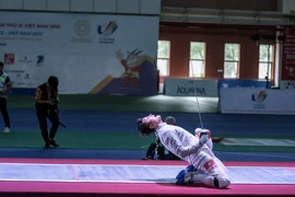 Kiếm thủ Vũ Thành An bảo vệ thành công tấm huy chương vàng nội dung kiếm chém cá nhân nam. (Ảnh: Minh Sơn/Vietnam+)