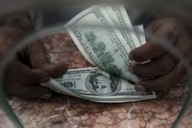 Đồng USD mất giá sau phát biểu về việc nâng lãi suất của Chủ tịch Fed