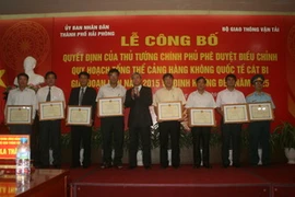 Lễ công bố Quyết định phê duyệt điều chỉnh quy hoạch Cảng hàng không Quốc tế Cát Bi. (Ảnh: Minh Huệ/Vietnam+) 