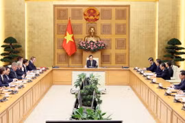 Phó Thủ tướng Trần Lưu Quang tiếp Đoàn doanh nghiệp Hội đồng kinh doanh EU-ASEAN. (Ảnh: An Đăng/TTXVN)