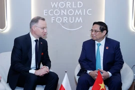 Thủ tướng Phạm Minh Chính gặp Tổng thống Ba Lan Andrzej Sebastian Duda. (Ảnh: Dương Giang/TTXVN)