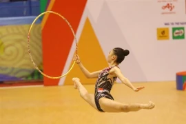 Bài thi với vòng của vận động viên Heng Wie Qi Katelin (Singapore). (Ảnh: Phạm Hậu/TTXVN)
