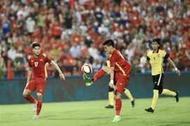 Một tình huống khống chế bóng của tiền đạo Tiến Linh của U23 Việt Nam trong trận đối đầu U23 Malaysia, trong khuôn khổ SEA Games 31, tại Phú Thọ tối 19/5/2022. (Ảnh: Huy Hùng/TTXVN)