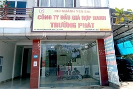 Công ty đấu giá Hợp danh Trường Phát tại số 430, đường Nguyễn Tất Thành, thành phố Yên Bái. Ảnh: (TTXVN phát)