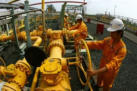 Vận hành hệ thống phân phối khí tại Công ty Khí Cà Mau (thuộc PV GAS). (Ảnh: Huy Hùng/TTXVN)