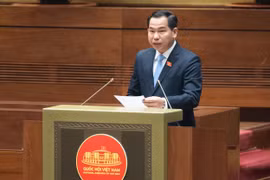 Chủ nhiệm Ủy ban Tài chính, Ngân sách của Quốc hội Lê Quang Mạnh báo cáo Quốc hội. (Ảnh: CTV/Vietnam+)