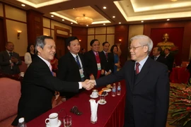 Tổng Bí thư Nguyễn Phú Trọng với các đại biểu. (Ảnh: Trí Dũng/TTXVN) 