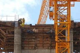 Thi công thủy điện Xekaman 3. (Ảnh: Ngọc Hà/TTXVN)