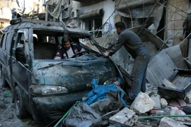 Cảnh đổ nát sau các cuộc giao tranh giữa quân đội chính phủ và phiến quân tại thành phố Aleppo, miền Nam Syria ngày 16/1. (Nguồn: AFP/TTXVN)