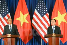 Chủ tịch nước Trần Đại Quang (bên phải) và Tổng thống Barack Obama tại cuộc họp báo. (Ảnh: Nhan Sáng/TTXVN) 