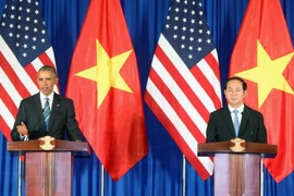 Chủ tịch nước Trần Đại Quang (bên phải) và Tổng thống Barack Obama tại cuộc họp báo. (Ảnh: Nhan Sáng/TTXVN)