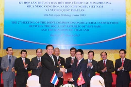 Ký biên bản ghi nhớ lần 2 về hợp tác song phương Việt Nam-Thái Lan ngày 20/3/2015. (Ảnh: Thống Nhất/TTXVN)