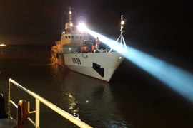 Tìm kiếm cứu nạn máy bay CASA-212. (Ảnh: Hồng Pha/TTXVN)