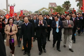 Chủ tịch nước Trương Tấn Sang dự lễ Ngày hội “Sắc Xuân trên mọi miền Tổ quốc.” (Ảnh: Nguyễn Khang/TTXVN)