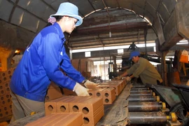 Hoạt động tại một doanh nghiệp sau cổ phần hóa. (Ảnh minh họa. Nguồn: TTXVN)