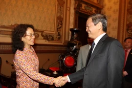 Lãnh đạo Thành phố Hồ Chí Minh tiếp lãnh đạo tỉnh Vân Nam-Trung Quốc. (Ảnh: Thanh Vũ/TTXVN)