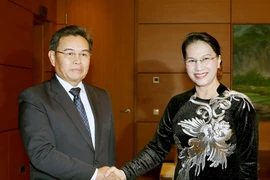 Chủ tịch Quốc hội Nguyễn Thị Kim Ngân tiếp ông Saysomphone Phomvihane, Ủy viên Bộ Chính trị Đảng Nhân dân Cách mạng Lào, Chủ tịch Ủy ban Trung ương Mặt trận Lào xây dựng đất nước. (Ảnh: Nguyễn Dân/TTXVN)