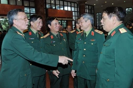 Các đại biểu tại buổi gặp mặt. (Ảnh: Trọng Đức/TTXVN) 