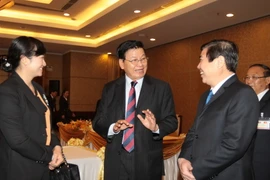 Thủ tướng Chính phủ Lào Thongloun Sisoulith làm việc tại Thành phố Hồ Chí Minh. (Nguồn: TTXVN)