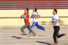 Vận động viên nữ khuyết tật thi chạy. (Ảnh minh họa. Nguồn: TTXVN)