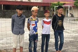 Các đối tượng bị bắt giữ. (Ảnh: Mạnh Minh/TTXVN)