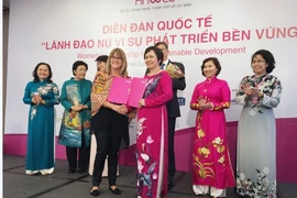 Đại diện Hội nữ doanh nhân Thành phố Hồ Chí Minh và Lãnh sự quán Australia. (Ảnh: Mỹ Phương/Vietnam+)