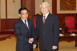 Tổng Bí thư Nguyễn Phú Trọng tiếp ông Phankham Viphavanh, Ủy viên Bộ Chính trị, Thường trực Ban Bí thư Trung ương Đảng Nhân dân Cách mạng Lào, Phó Chủ tịch nước Cộng hòa Dân chủ Nhân dân Lào. (Ảnh: Trí Dũng/TTXVN) 