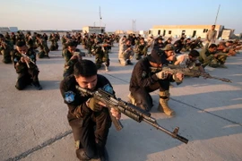 Lực lượng tự vệ Iraq tham gia cuộc diễn tập quân sự ở al-Zubair, gần thành phố miền nam Basra ngày 13/2. (Nguồn: AFP/TTXVN)