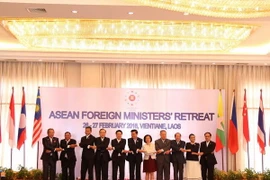 Phó Thủ tướng, Bộ trưởng Ngoại giao Phạm Bình Minh và các đại biểu tại hội nghị. (Ảnh: Phạm Kiên/Vietnam+)