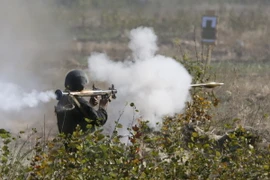 Binh sỹ Ukraine trong buổi diễn tập quân sự tại vùng Kiev ngày 2/10. (Nguồn: Reuters/TTXVN)
