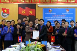 Quang cảnh lễ ký kết. (Ảnh: Nguyễn Nam/TTXVN)